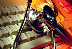Picture of a stethoscope on a keyboard